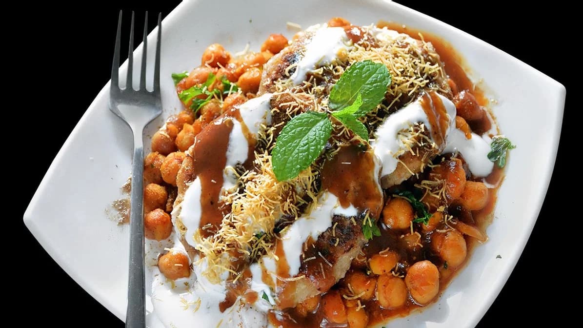 Chole chaat with chickpeas, yogurt, tamarind sauce, sev and mint from Koyla Indian Cuisine