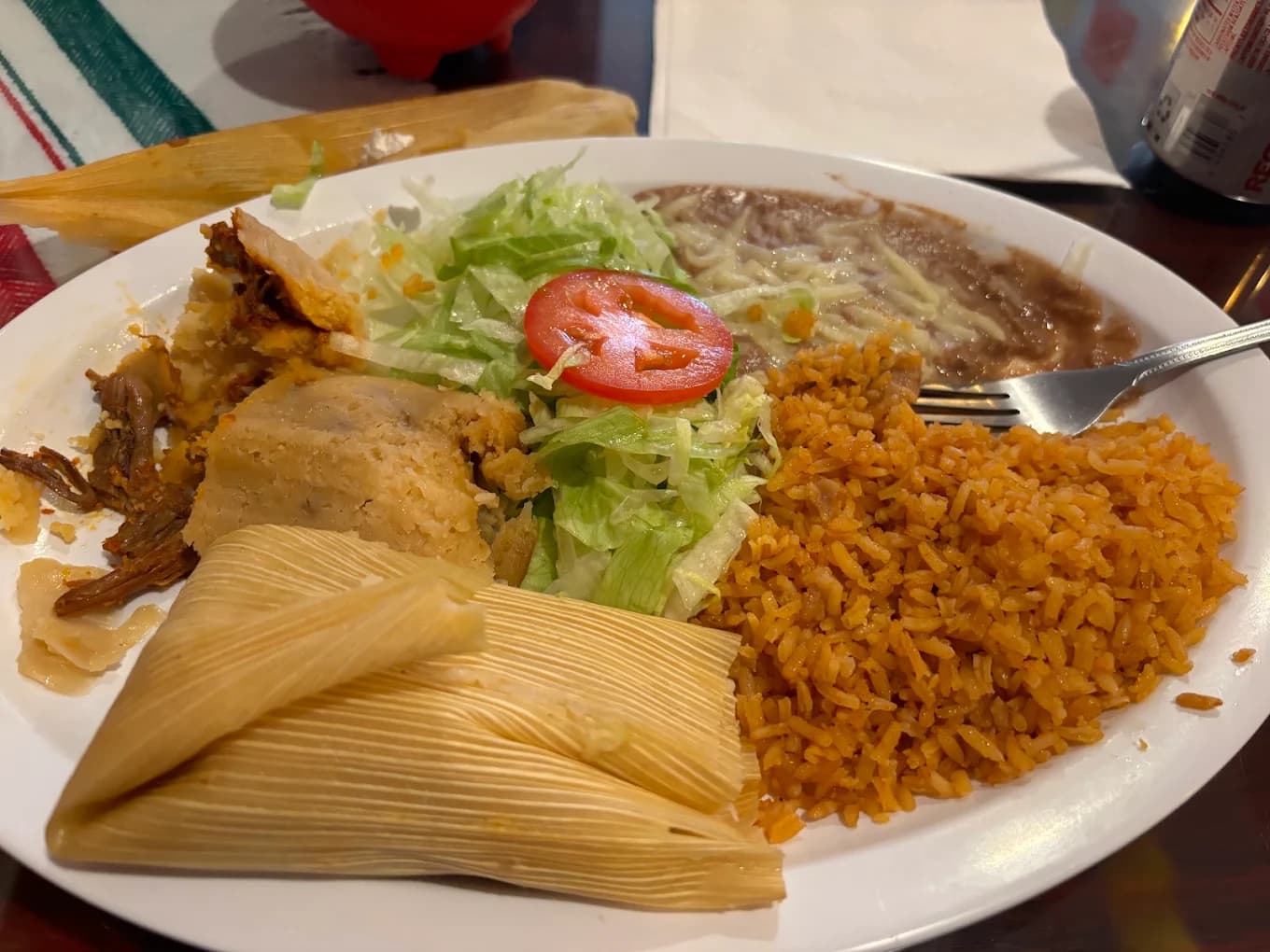 Tamale plate with rice, refried beans and shredded lettuce at Mary's Tamales