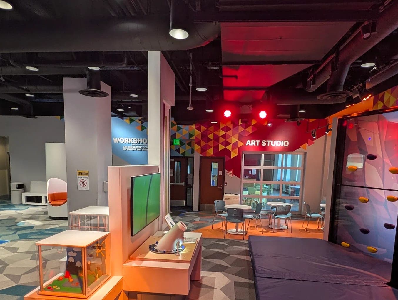 Interior of Randall Lewis Second Story and Beyond, with the Art Studio and Workshop rooms, hands-on exhibits and a climbing wall